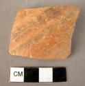 Potsherd - black matt on reddish surface, yellow minyan type ware