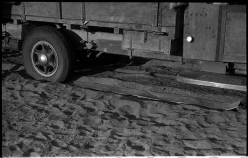 Rear wheel of expedition truck, with sand and chain