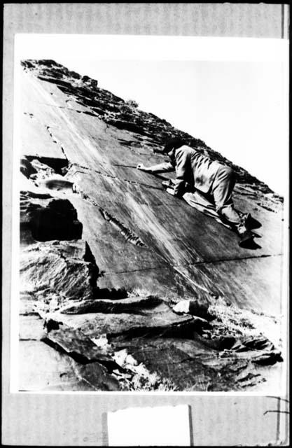 Walter Battiss climbing on wonderstone at the Gestopte Fontein site