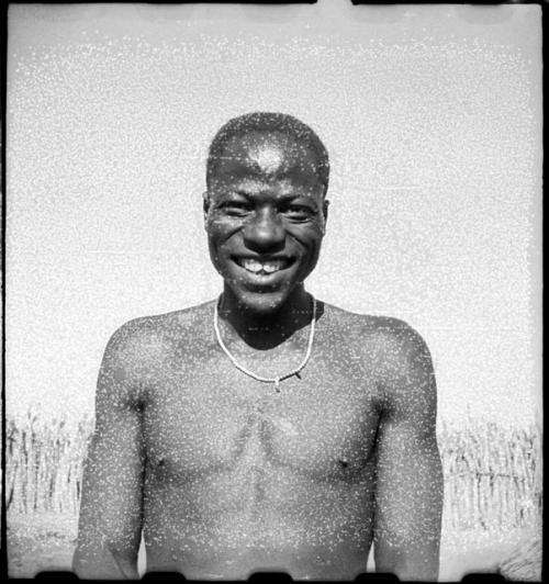 Man showing his filed teeth