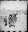 Group of children standing inside their kraal