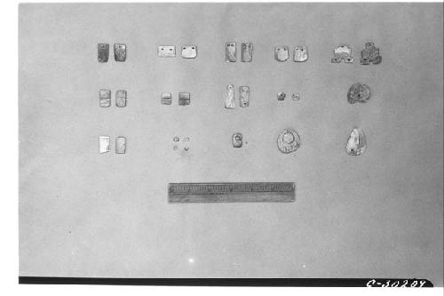 T. of Wall Panels. Shell ornaments found in pit at base of early inner stairway.