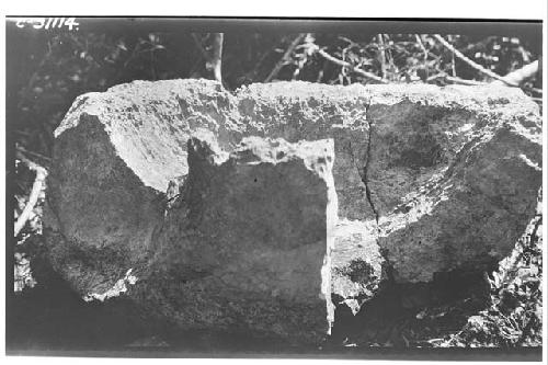 Ancient heavily grooved metate from mound on road to Paul's Temple.