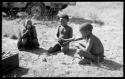 "Little ≠Gao," Tsamgao, and /Gaishay with Tsamgao's handmade toy gun, closer up