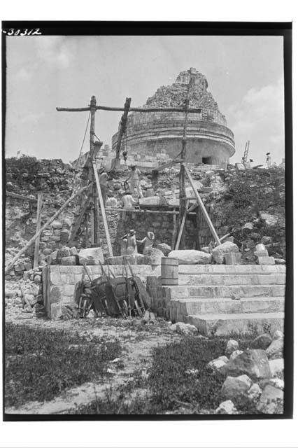 Caracol. Repair of cornice of lower platform N. of stairway.