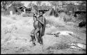 Unidentified boy carrying "Little ≠Gao"