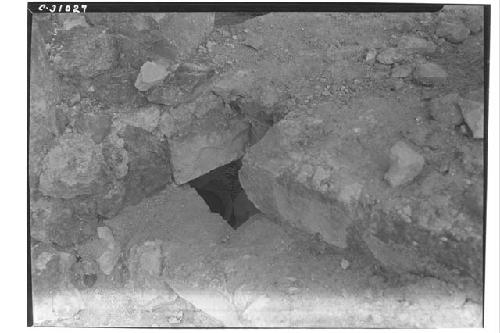 Caracol, olla under block of masonry top of niche - upper stairway.