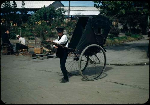 Man with rickshaw