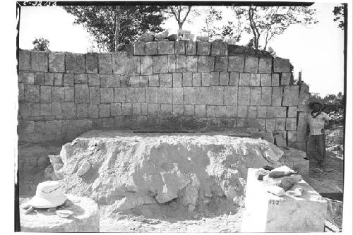 Debris beneath which lies sculptured altar at Mercado Colonnade.