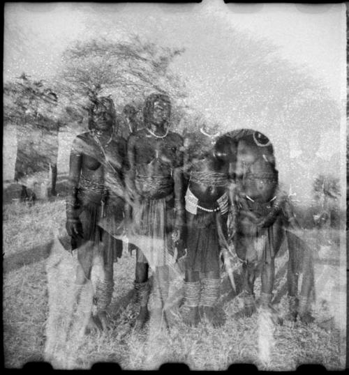 Group of women standing (double exposure)