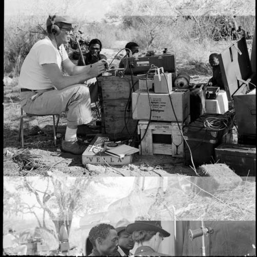 Men sitting next to Nicholas England using recording equipment