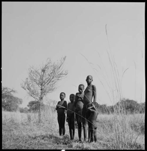 Group of children standing near Muzwamo River