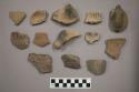 Ceramic rim and body sherds, and one bird head effigy and one loop handle sherd