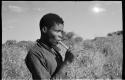 Boy eating root