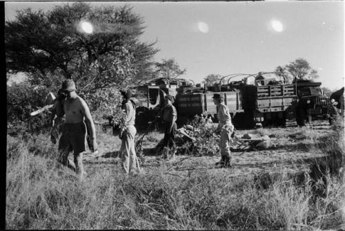 Lorna Marshall, Elizabeth Marshall Thomas, and two other expedition members clearing the camp site