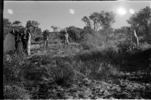 Expedition members working on the backfire