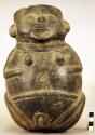 Ceramic effigy jar, female figure