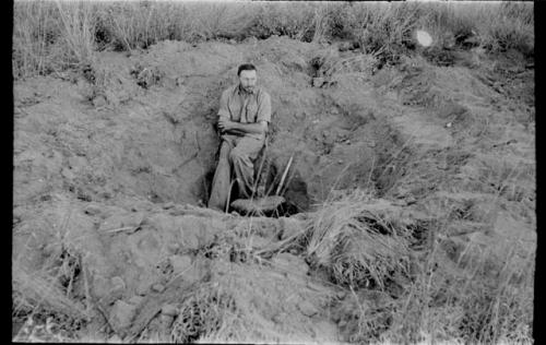 Robert Story with plant specimen (plant as a storage organ)