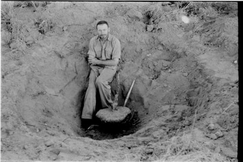 Robert Story with plant specimen (plant as a storage organ)