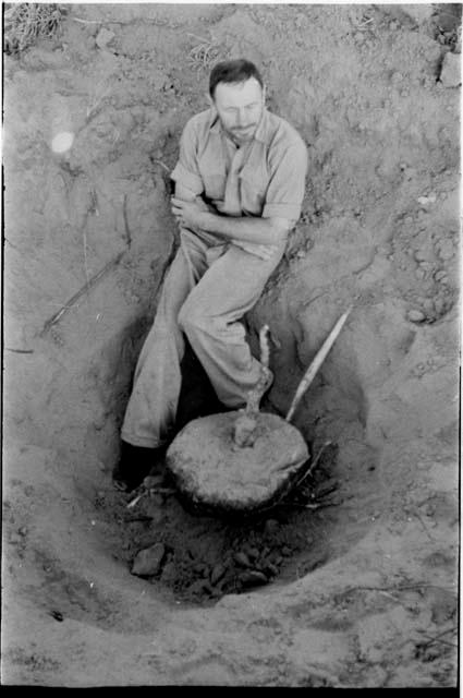 Robert Story with plant specimen (plant as a storage organ), close-up