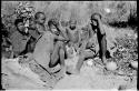 Dasi!na, /Gaiamakwe, N!whakwe, Tsekue, !Oukabe, and another person sitting