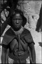 Woman standing in front of baobab tree