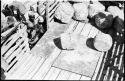 Men working next to a truck loaded with salt at Bitters Pan