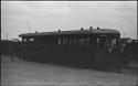 Person standing in front of train car