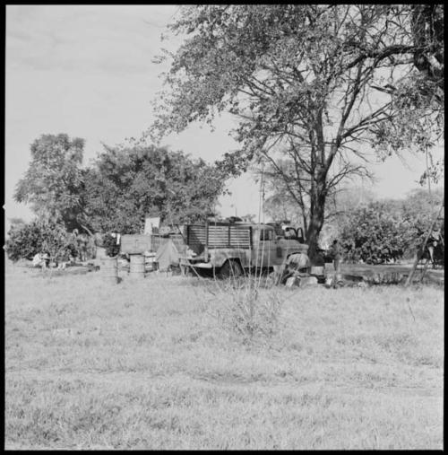 Expedition trucks and encampment on C. J. Mathias's land