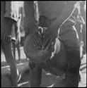 Man playing a drum, close-up of his hands