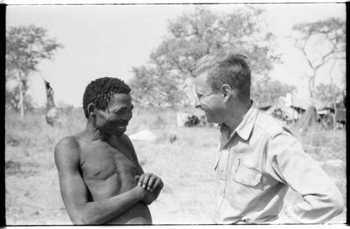 Close-up of "Qui Navel" and Daniel Blitz, smiling at each other