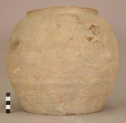 Large greyish cream colored ware urn - design of concentric diamonds