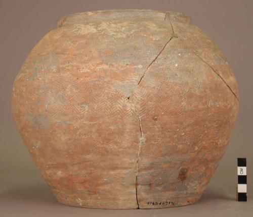 Large pottery urn - mottled red and grey ware; herring bone pattern