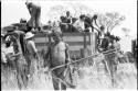 Ju/'hoansi getting off a truck