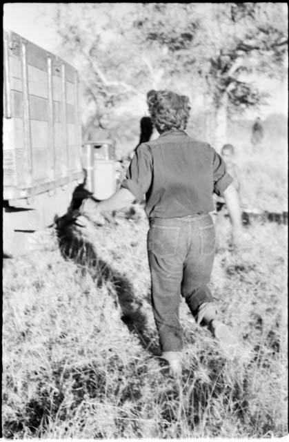 Elizabeth Marshall Thomas walking toward expedition truck