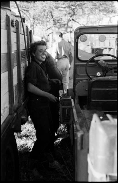 Elizabeth Marshall Thomas leaning against expedition truck