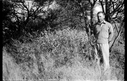 Robert Story standing in the brush