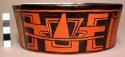 Wooden model of polychrome orange and black half pot