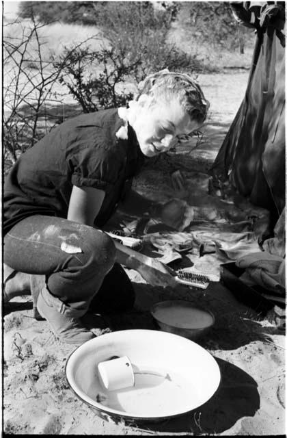 Elizabeth Marshall Thomas washing her hair