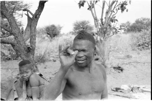 Visiting man demonstrating huntinghand signals