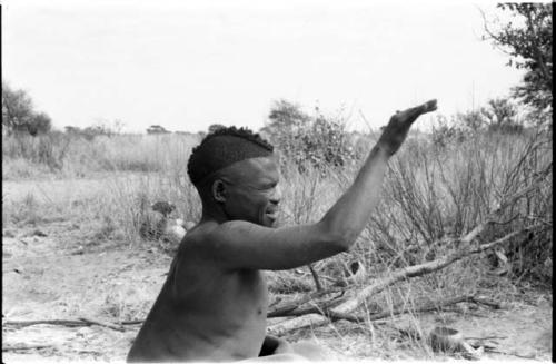 Visiting man in profile, Visiting man demonstrating huntinghand signals