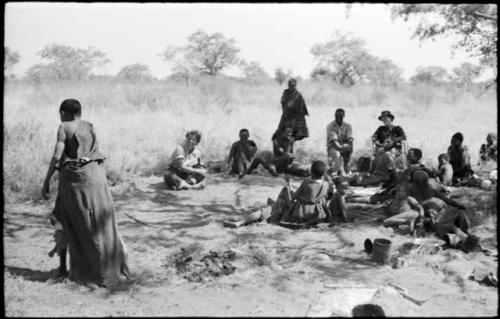 /Naoka dancing, and a group of people watching including Kernel Ledimo, Lorna Marshall and Elizabeth Marshall Thomas