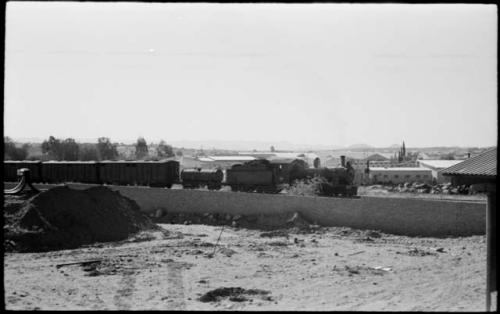 Freight train and buildings