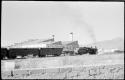 Freight train and buildings