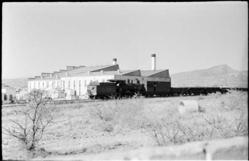 Freight train and buildings