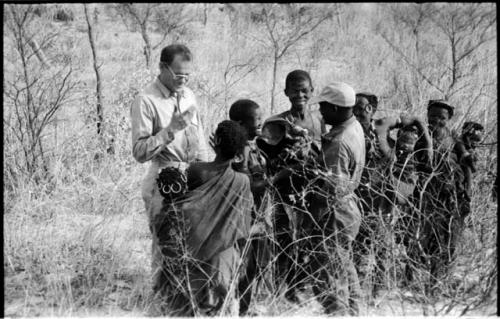 Group of women standing with Kernel Ledimo and William Donnellan