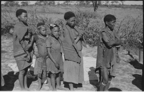 Group of people talking with L. F. Maingard, with Laurence Marshall photographing