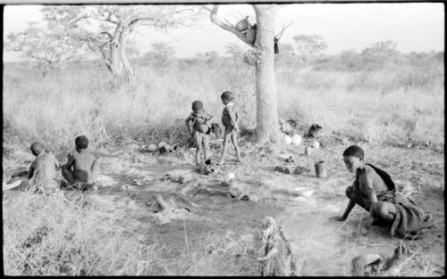 //Khuga and four children sitting in the living place