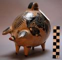 Large pig--bank with a handle on top. white with blue floral decoration