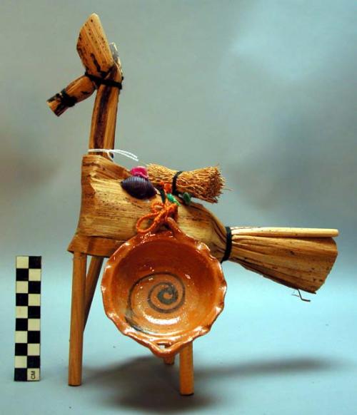 Corn husk and wood burro figurine